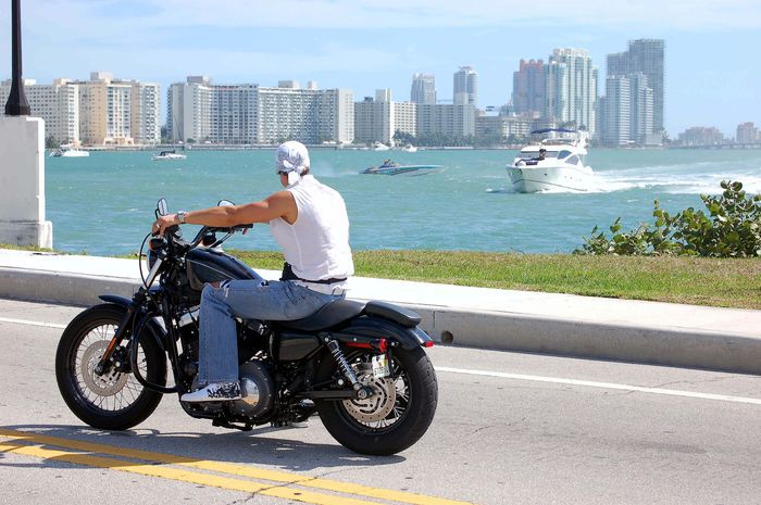 Biker riding a motorcycle Biker riding a motorcycle